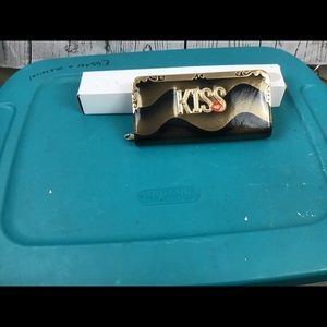 Wallet with the word kiss on front